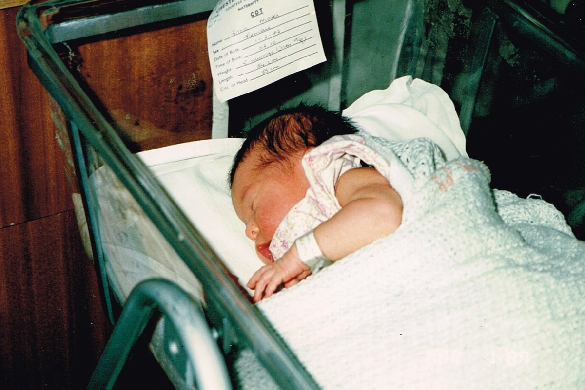 madbins's tweet photo. Today (Thurs), #Brina should have turned 31. Instead, we started the process of clearing her house. It's all very strange and surreal. And wrong.

Here she is aged just 16 hrs &amp; 40 mins. We kept that sign which was stuck to her cot; I saw it today. https://t.co/NrnIrBc7hH