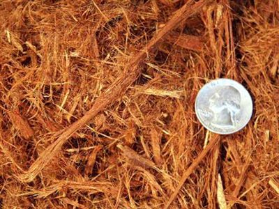 Gorilla Hair Redwood Bark. Shredded Redwood Bark is derived from raw redwood bark ground to size. This bark is an excellent ground cover for uneven surfaces. For more information visit our website earthstonerock.com
