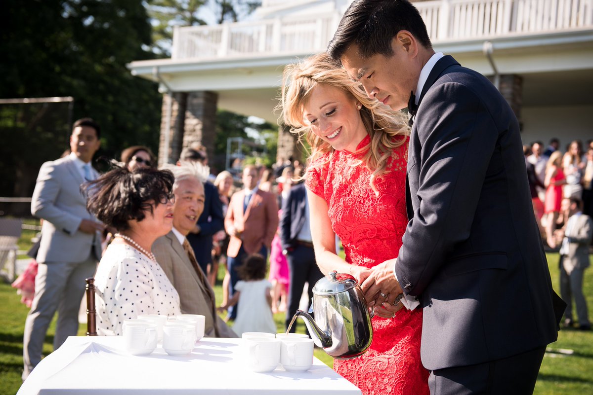 Take tradition and make it your own! I love this #teaceremony beside the lake during cocktail hour for Olivia and Glen last summer. Love the dress, location, it was fun! Just like them! Photo Credit: Wedding/Portrait Photographers