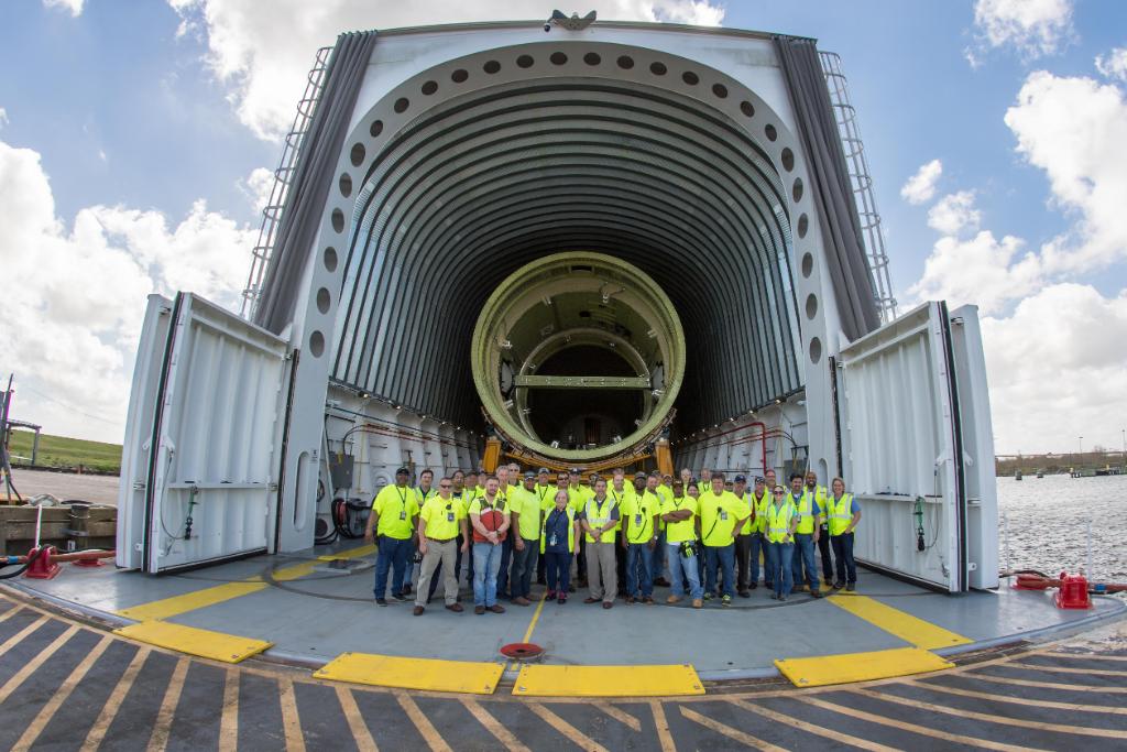 NASA_SLS's tweet photo. A structural test version of the #NASASLS intertank was loaded onto @NASA's barge Pegasus at #NASAMAF to head to @NASA_Marshall for further testing! MORE photos of the intertank here >> https://t.co/mBBUtrlIJW https://t.co/huzdTMUM7c