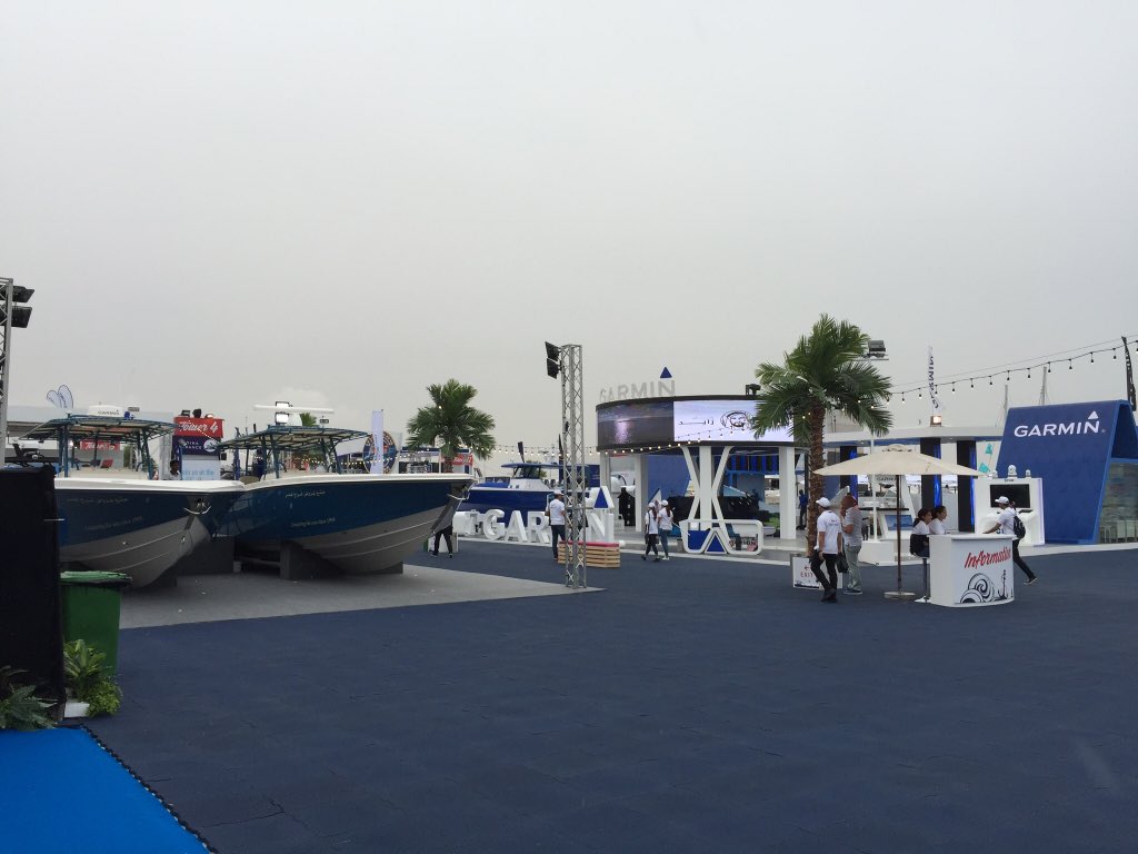 DubaiEye1038FM's tweet photo. A little bit of rain can’t dampen the atmosphere @DubaiBoat Show! Lots to see and do again on day four #DIBS #DIBS18 https://t.co/1194K0LkAp