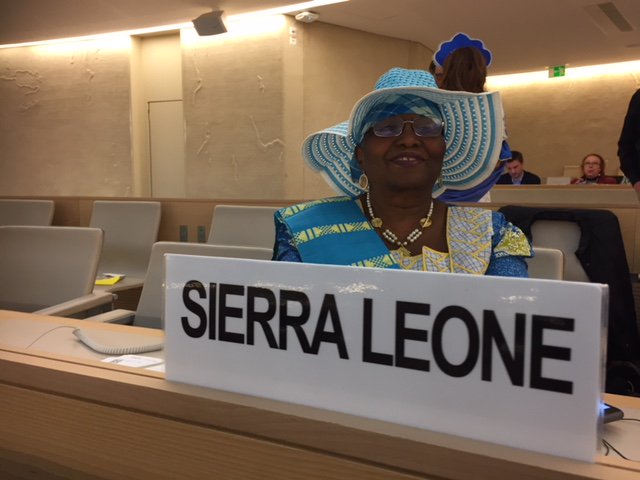 Ambassador Yvette Stevens wears national colours for the National Dress Day at the 37th HRC.