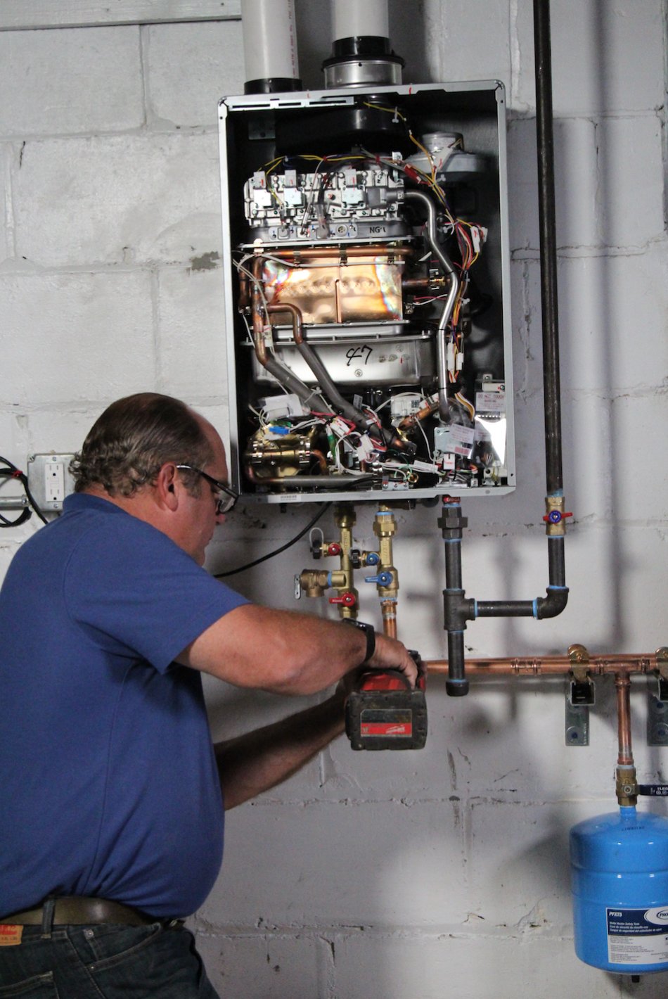 Ask This Old House on X: What are your thoughts on tankless water heaters?  If you're thinking about one in your house, Richard did a deep dive  explanation on one earlier this