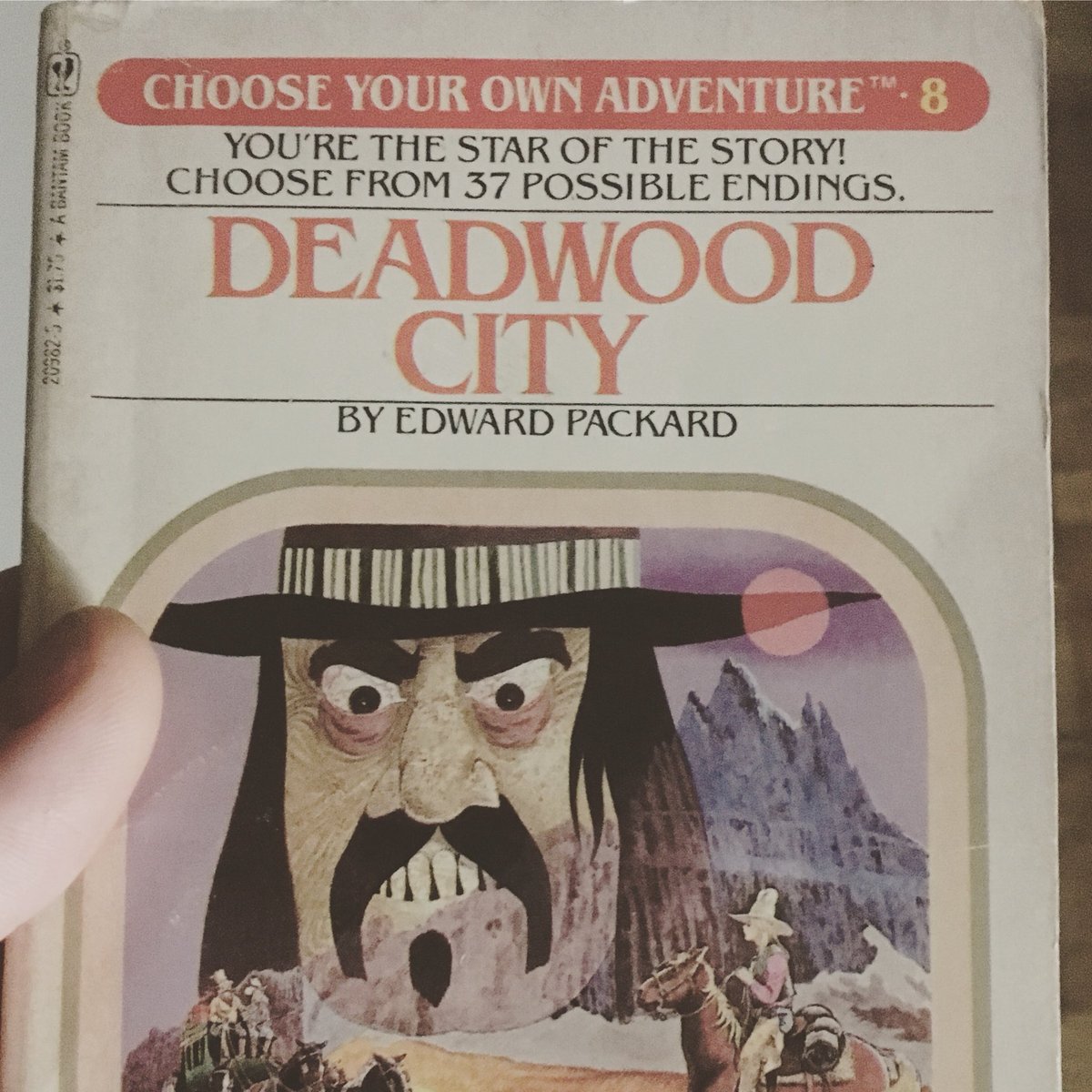 danieljglenn's tweet photo. Saw this on my shelf today!  An #original #chooseyourownadventure #book about #deadwood #southdakota! The town right next to #leadsouthdakota, home to the #homestakemine/@SanfordLab! I tried 3x &amp; did not make it through the book alive! @FascinatingNoun Ep: https://t.co/6wvaaPpJe6 https://t.co/E0AIhVB5JD