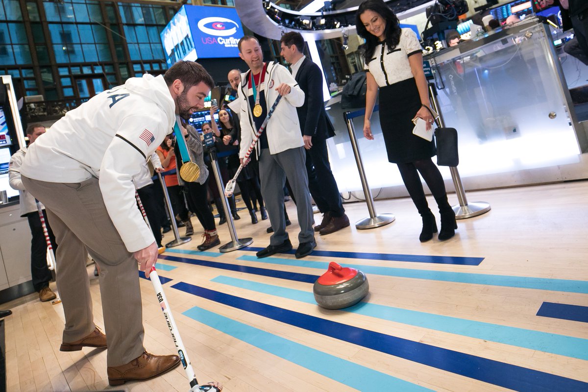 NYSE's tweet photo. Stones, brooms, and mustaches. You know what that means: The @usacurl team rang The Opening Bell https://t.co/J46KkYpLjl