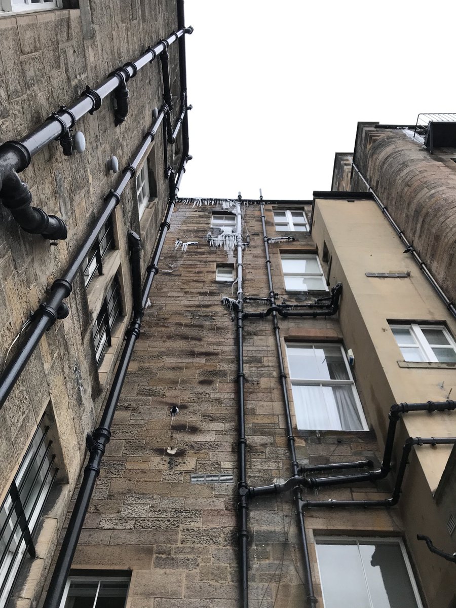 janiedevlin's tweet photo. @edinburghpaper Worthwhile looking up as you step out the door, half meter icicles look quite menacing ! #BeastfromEast #edinburgh #snow https://t.co/M8KbpJkC6I