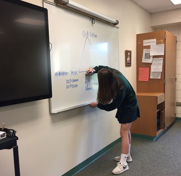 UrsulineLions's tweet photo. Claire getting ready to lead us in prayer and Anna drawing The Trinity Diagram. #DoctrineoftheTrinity #ItsaMystery #ChristianAwareness #ItsMrsWeller #FacultyFriday https://t.co/QxiZUIJdef