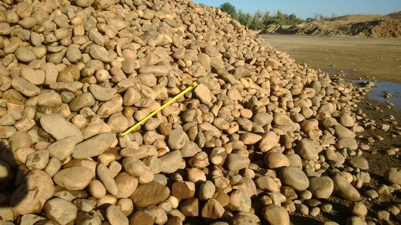 From the north end of Central Valley of California cobbles are light tan, brown and deep blue-purple in color. Yosemite cobble colors increase in quality over time as the tan sand / earth colors fade from the stone. For more info and purchasing visit earthstonerock.com