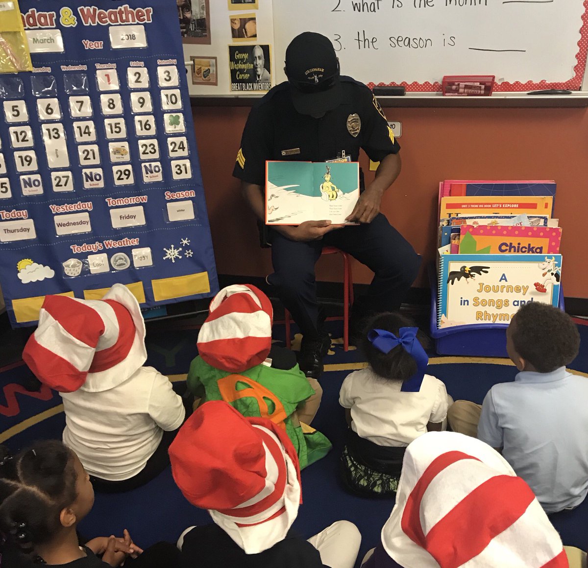 BhamPolice's tweet photo. #ReadAcrossAmericaDay today was wonderful at Oxmoor Valley Elementary! Our dispatchers and uniformed officers had a great time! #readingupsidedown #theyknewthewords @BhamCitySchools https://t.co/bPkAwSSJXc