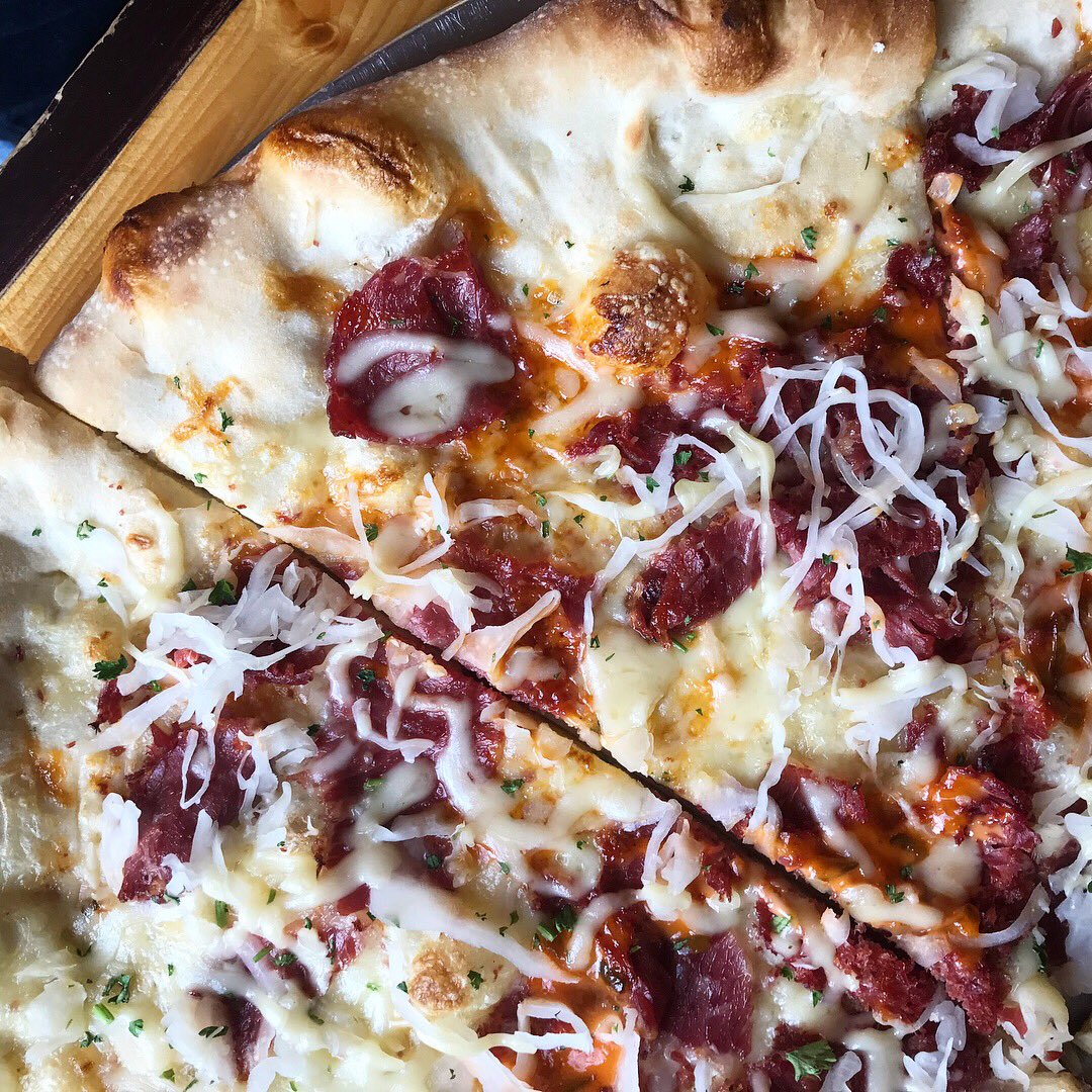 IansMadison's tweet photo. Happy #FreePizzaFriday! Retweet this tweet and we’ll pick one lucky follower to take home 8 free slice cards! #IansPizza #BuffaloCauliflower #HotItalianBeef #Reuben https://t.co/VH0VnPwe3o