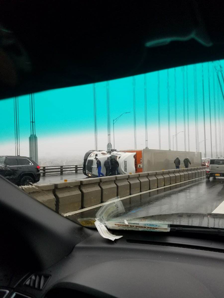 Overturned trailer on Verrazano Bridge uper level