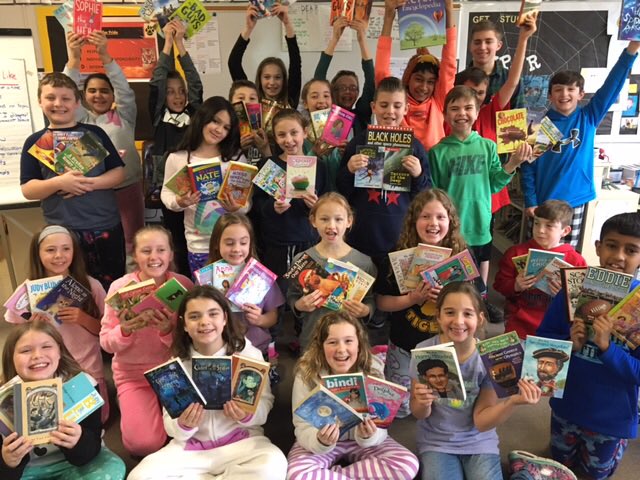 Me. Behling’s class proudly displays the books they got from the book swap. Happy Reading! #ReadAcrossTitus  #tituspride #SouthSide