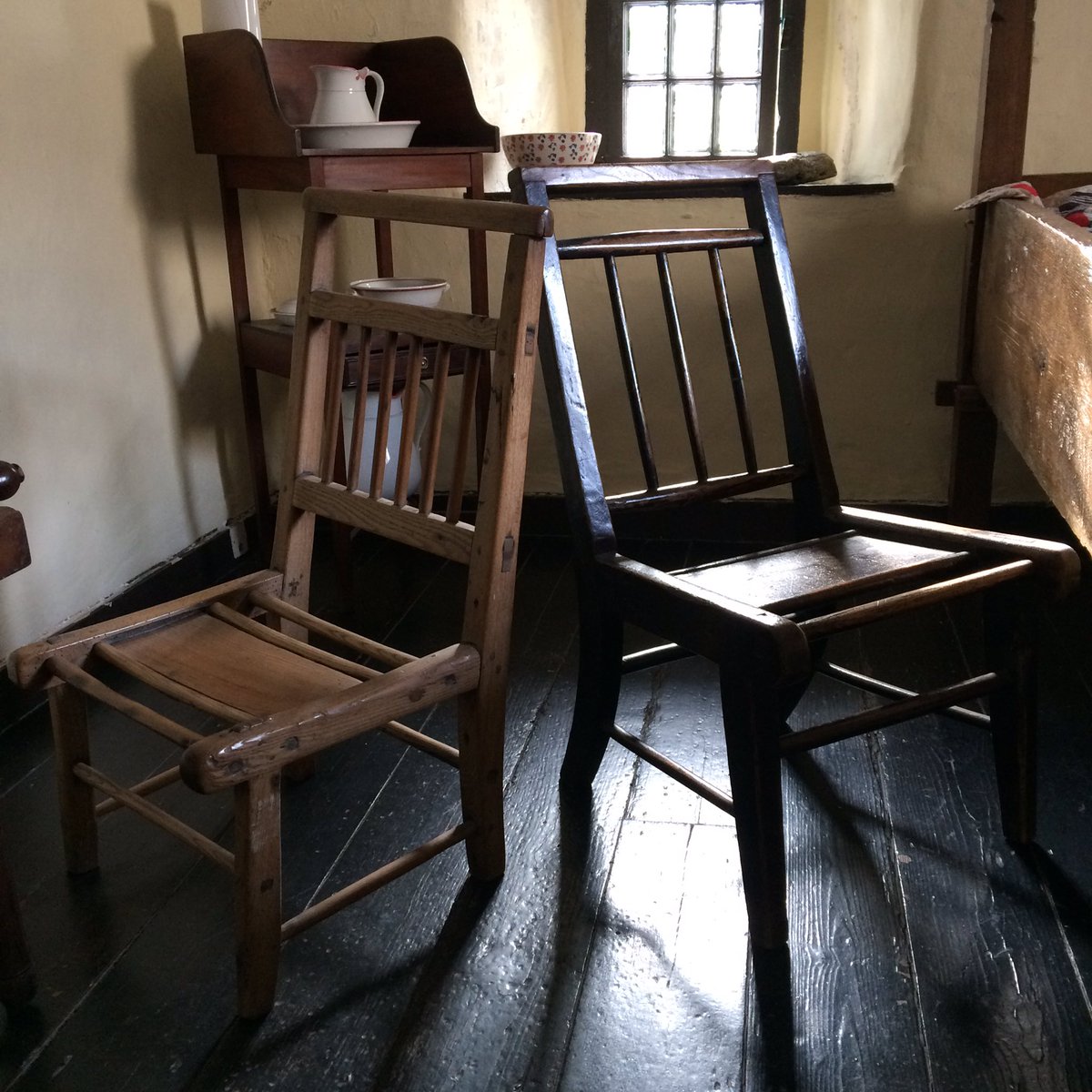 IndigoCarnie's tweet photo. Two distinctive #Caithness chairs at #HughMiller'sBirthplace in Cromarty - love seeing #RegionalFurniture (almost) in situ! And the unusual structure meant deviating from usual chair handling practice #FeltNaughty @NTSCollections https://t.co/DJbim5fQan