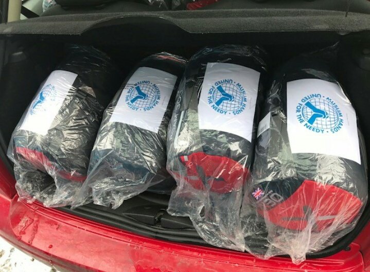 BRCNottsER's tweet photo. How many sleeping bags can you fit in a Mini? Thankyou to @muslimhandsuk for your donation of a further 20 sleeping bags to the sit-up service at London Road fire station #Nottingham helping us to support rough sleepers during freezing temperatures #StormEmma https://t.co/GP5DHgqm73