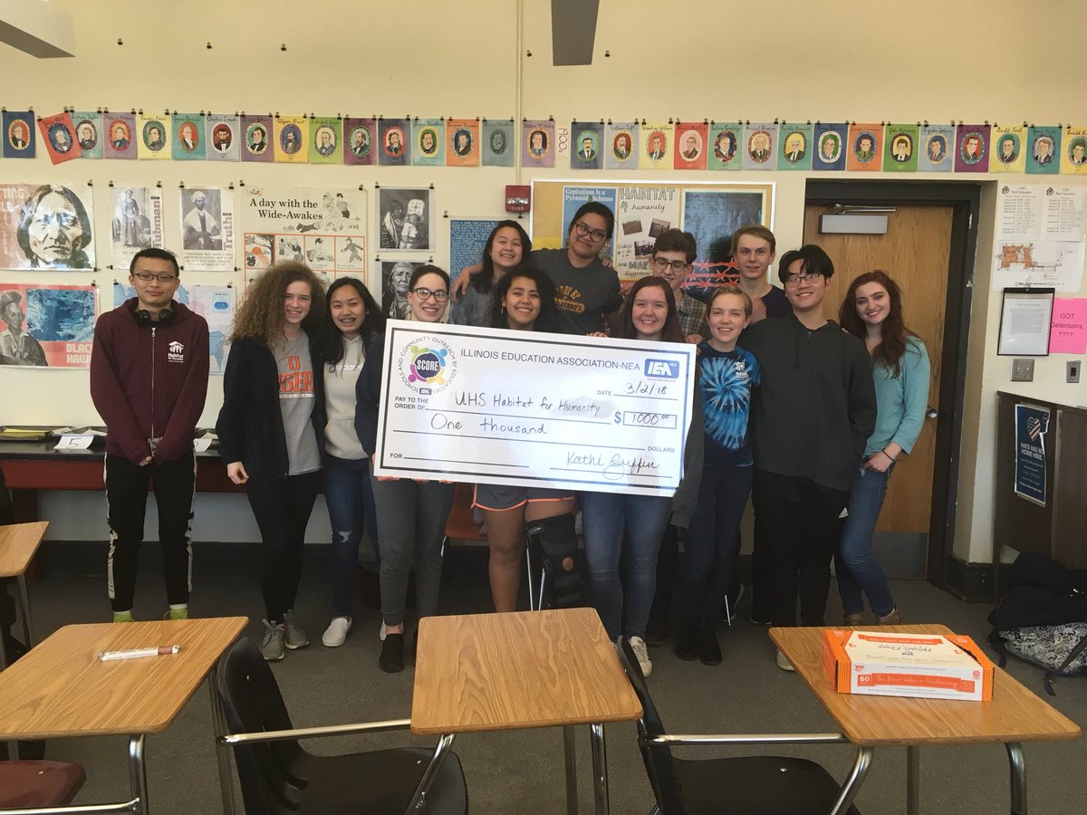 UHS_Habitat's tweet photo. We got a big check! Thanks to @ieanea for the grant, which we use to help students afford the fees for our service learning trip to Tutwiler, MS. #IEAhelpsout #TeachUrbana #MyTigers https://t.co/RaT7WS3f9e