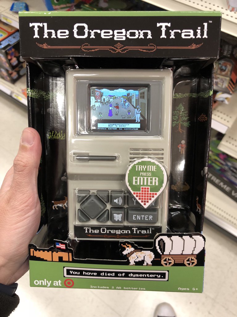 guyselga's tweet image. Some genius took the DOS version of Oregon Trail and put it in a handheld game. $25 at Target. Awesome