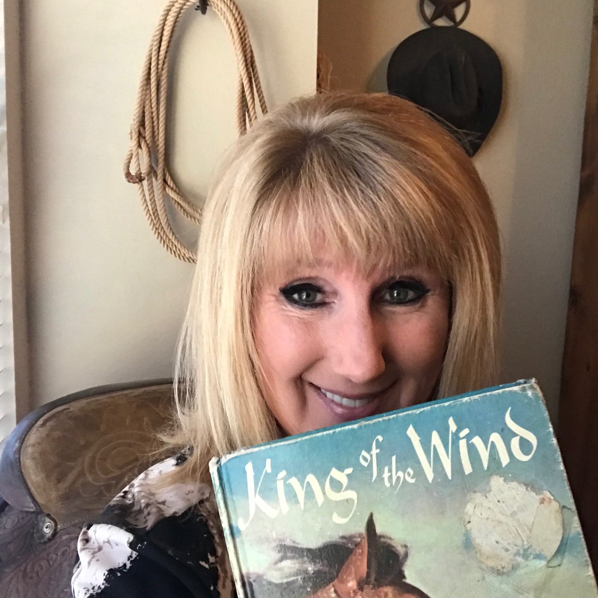 PamReece1722's tweet photo. Reading my favorite book from elementary...King of the Wind by Marguerite Henry...of course I’m from Texas with a saddle &amp; lasso in my office! @Ltopek #ShelfieSpring @RigorRelevance @monnicholas1969 https://t.co/jk4pOADoaz