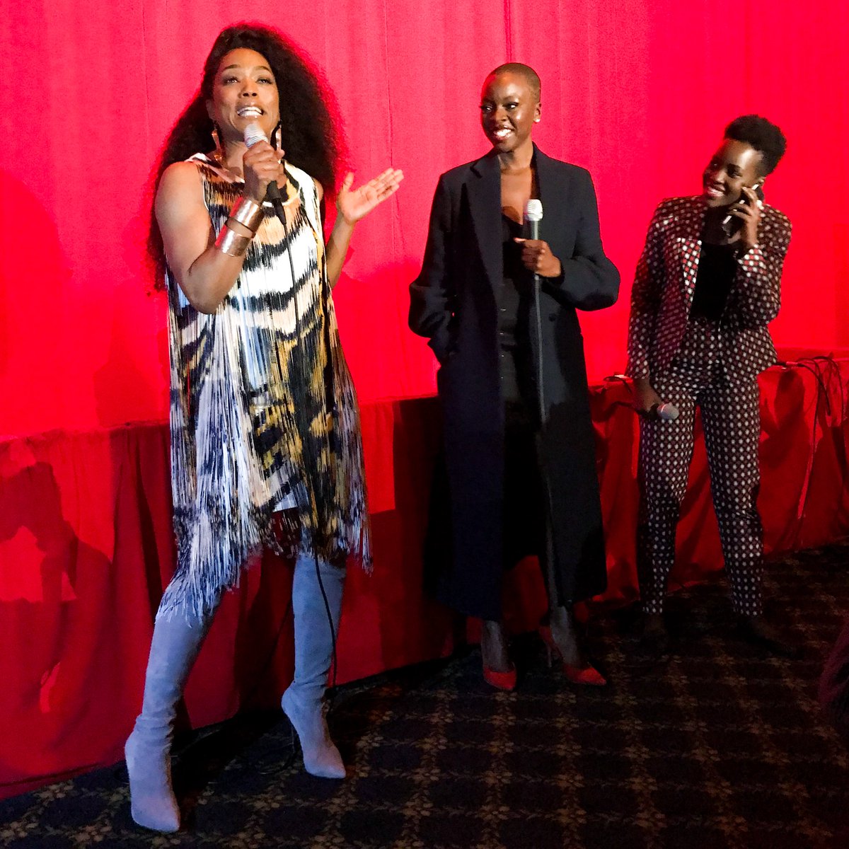theblackpanther's tweet photo. Wakanda Forever. @ImAngelaBassett, @danaigurira, and @Lupita_Nyongo surprised fans at a #BlackPanther screening! Watch our Instagram Story to see more. https://t.co/HST9BxXnHl