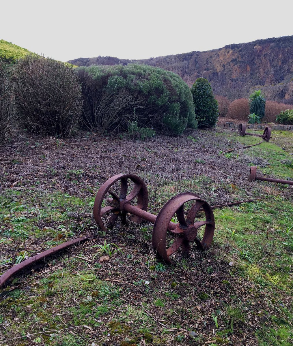 SunSeaStone's tweet photo. Photograph of the wheels from the locomotives used to take quarried stone away from #penlee quarry #archaeology #students #exhibition https://t.co/B65sj9TiHr