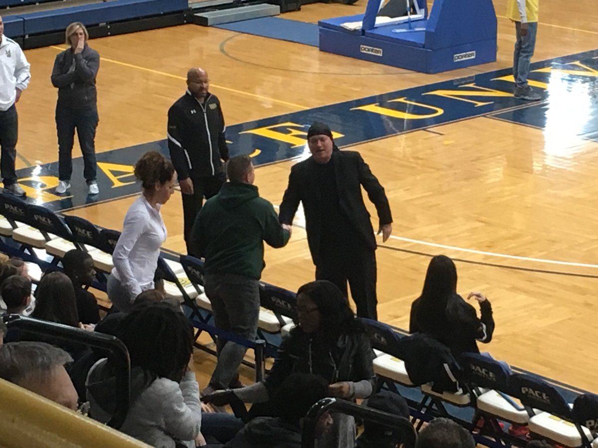 Ramapo has arrived. Head coach Steve Loscher, donning his do-rag, working the crowd pregame