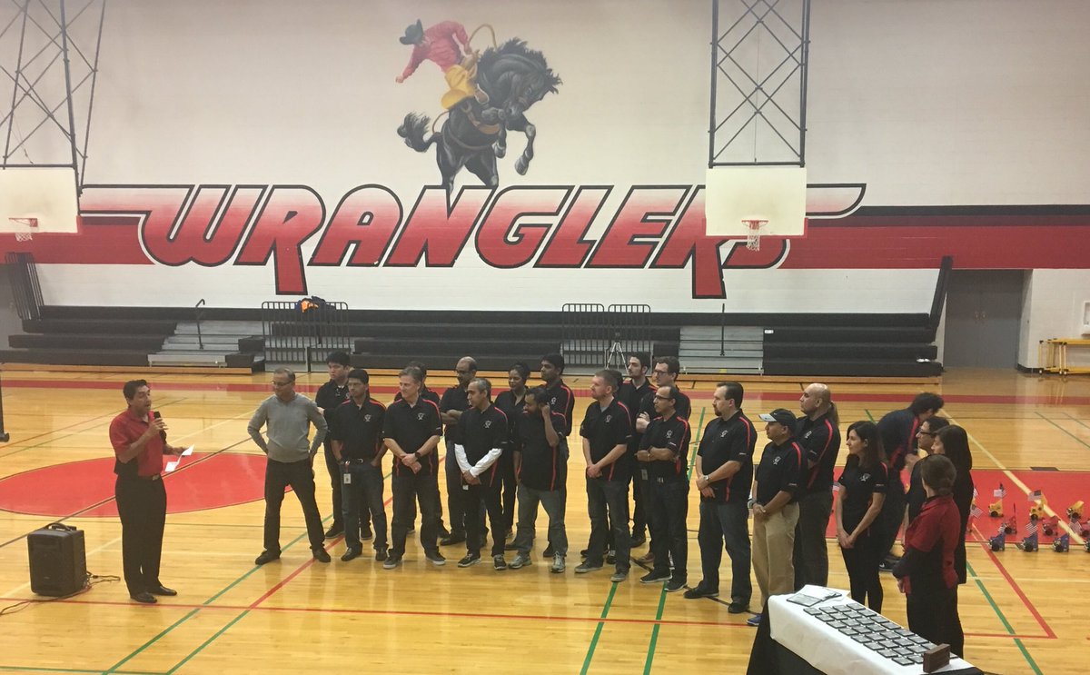 JangryGuerra's tweet image. #devopsVZ - the unofficial mascot of the #TxDojo, the Rog-bot, is the robot parade grand marshall at the  @coppellisdef @verizon red and black robotics camp closing ceremonies