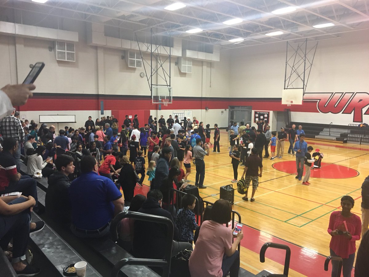 JangryGuerra's tweet image. #devopsVZ - the unofficial mascot of the #TxDojo, the Rog-bot, is the robot parade grand marshall at the  @coppellisdef @verizon red and black robotics camp closing ceremonies