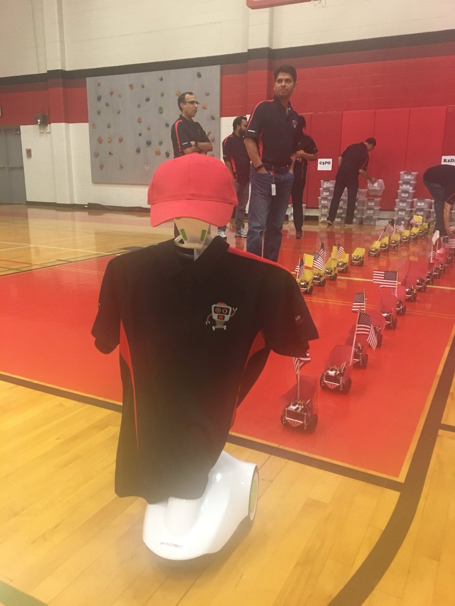 JangryGuerra's tweet image. #devopsVZ - the unofficial mascot of the #TxDojo, the Rog-bot, is the robot parade grand marshall at the  @coppellisdef @verizon red and black robotics camp closing ceremonies