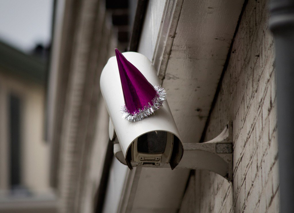 HoardingSnacks's tweet photo. To celebrate George Orwell's 110th birthday, Dutch artists fitted a bunch of party hats for city surveillance cameras to make us aware of just how much Big Brother is watching us. #3UA3 https://t.co/sEh4SLSmw0