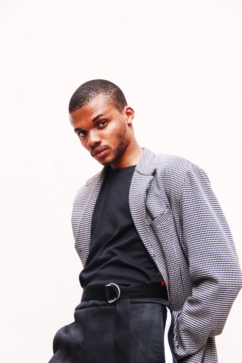 YOU_NIGERIA's tweet photo. Our Monochrome coat with red lining details and black pants with white tape from our "Tape series" #YourStyleIsYOU #YOUmen https://t.co/iIGsAwYOlx