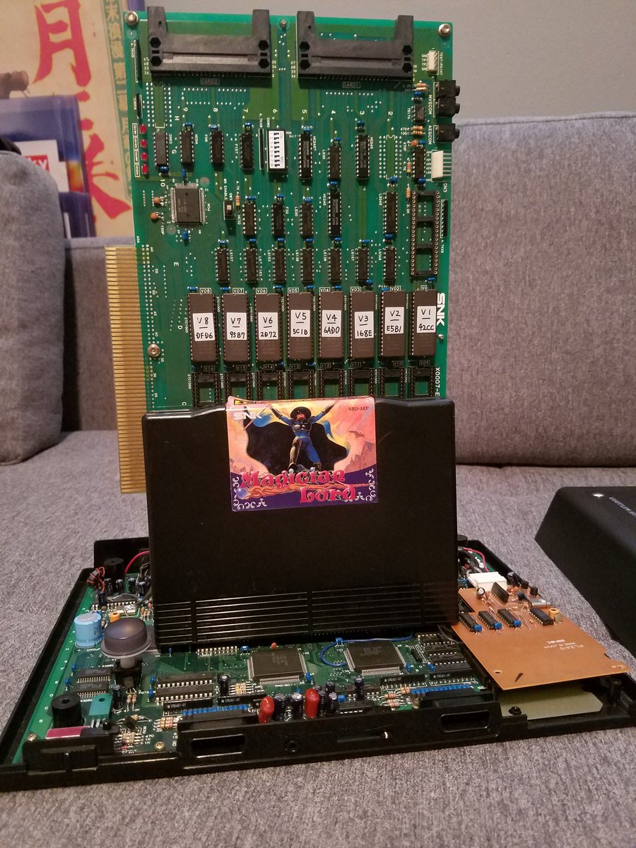 turfmasta's tweet photo. Here's the #NeoGeo X0007 development board. Early model w/ chips dated 1989 1990. Works on both MVS and Home Cart systems and has rarely used link port support.
*Magician Lord for size reference. #SNK #NEODEV https://t.co/281Uzi0uvZ