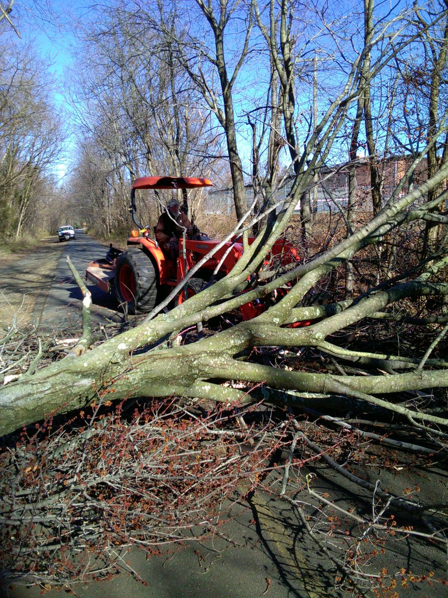 WODTrail's tweet photo. W&OD Trail staff in action near Loudoun County High School in Leesburg removing a tree blocking the trail. #windmaggedon #NOVA_Parks https://t.co/zEHYCachjf