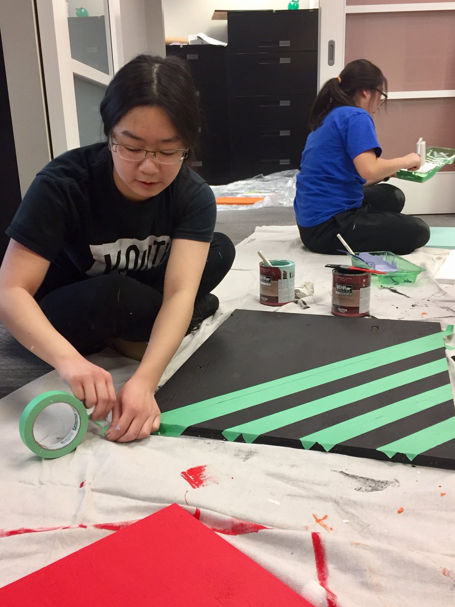 YouthCentralYYC's tweet photo. Happy #YVCDay! The #YouthCentral office has transformed into a construction zone while our awesome @YVolunteerCorps volunteers build little free libraries! https://t.co/XLJdvgoCkA