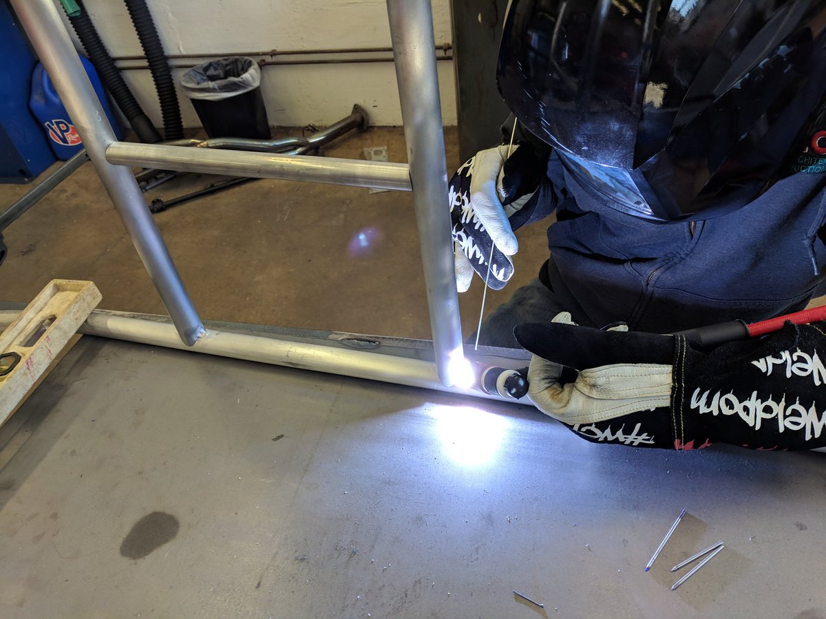 jdufkis's tweet photo. The kids were working hard on their high mileage car during auto club yesterday. Main hoop is all tacked in and looks great, in addition to being very safe. @RMHSMUSTANGS @District214 https://t.co/x1X4KcAIFW