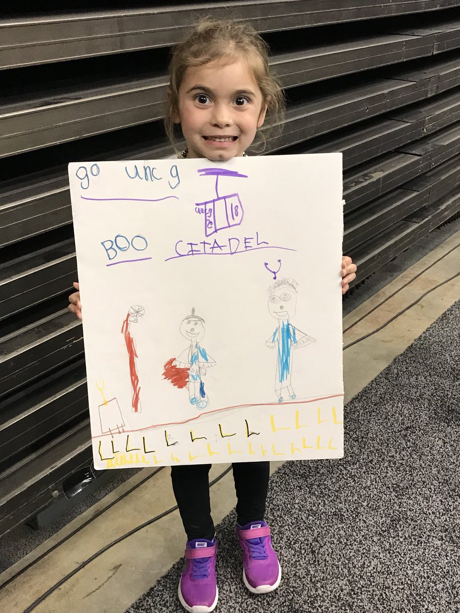 KRecHoos84's tweet photo. SoCon Coach of the Year gets some love from his niece after quarterfinal win. #letsgoG #STRIDE #unclewes https://t.co/dxBuEXGUNN