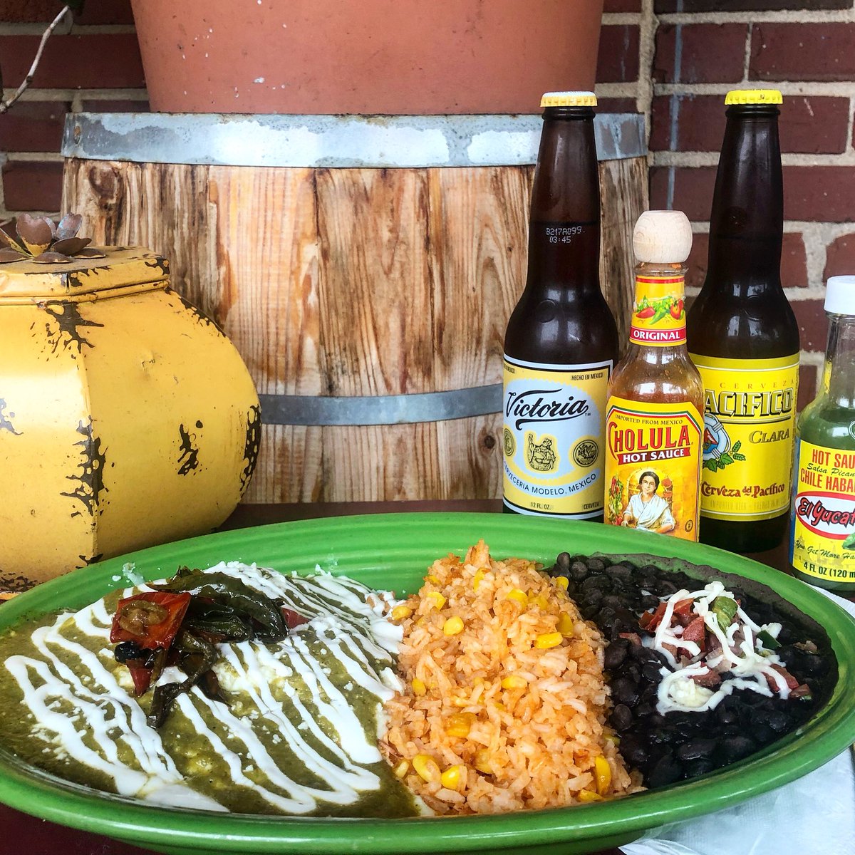 When’s the last time you tried our Santa Fe Enchiladas? 2 stacked, soft hand-made blue corn tortillas stuffed w/seasonal pulled chicken, queso fresco, Chihuahua cheese, sautéed peppers, topped w/tomatillo sauce, touch of Mexican cream. Served w/ Mexican rice &amp; SantaFe black beans