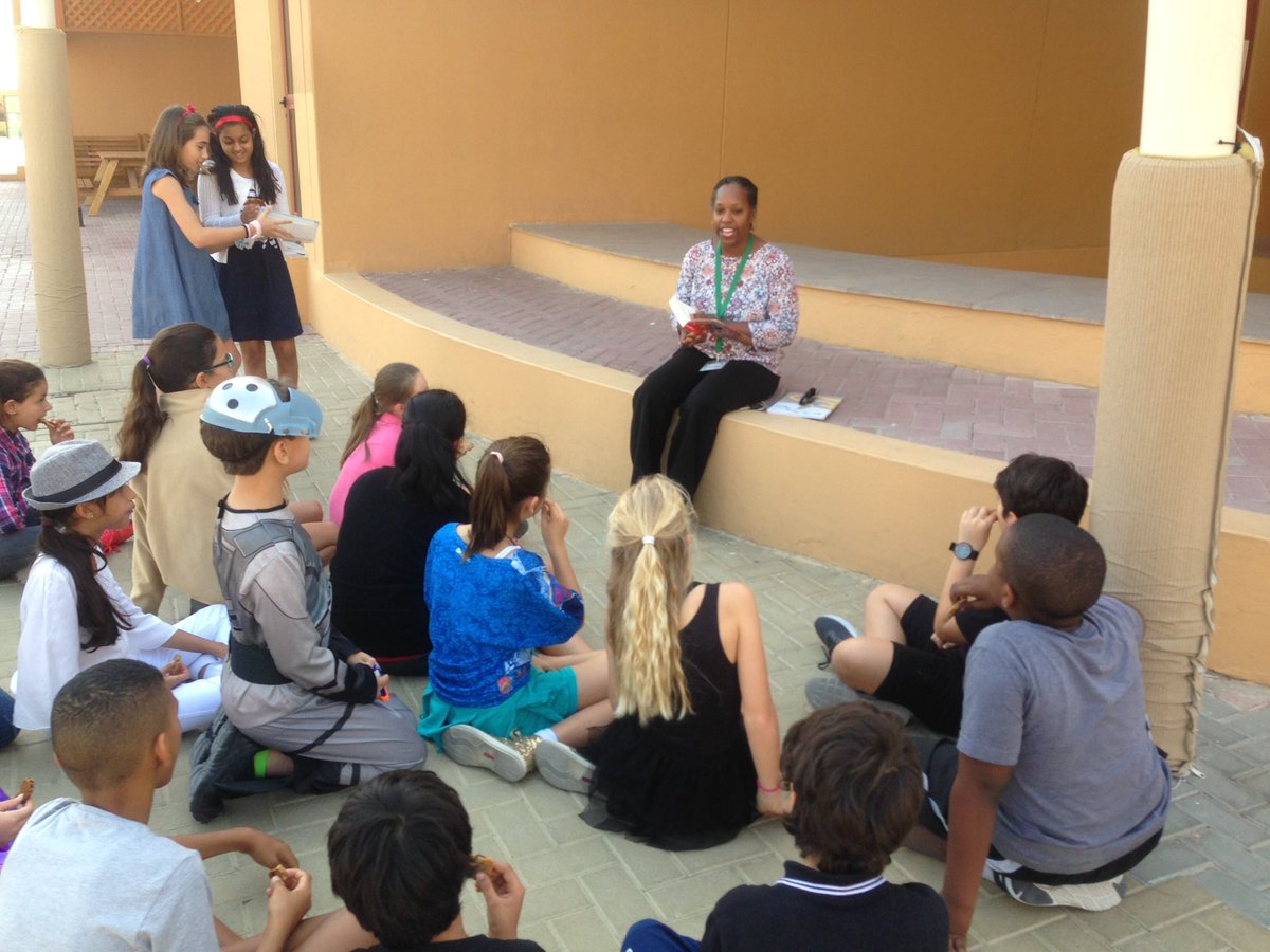 TraceyCroukamp's tweet image. Grade 5 students enjoying a book and biscuits (baked by 2 of our grade 5 students). Gangsta Granny read by a parent volunteer. #behappybegcs #gcsbookweek @GCSPYPG5