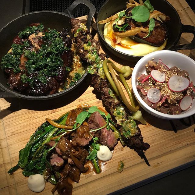 forageVancouver's tweet photo. It’s Saturday so it’s #Bisonboard night. Grilled ribeye steak bison heart poke with spot prawn dressing, tenderloin skewer with pickled garlic scape vin, smoked confit shoulder, shank ‘osso bucco’ with farro risotto. All from @turtlevalleybison They always sell out so when y… https://t.co/8g3YKicEGX