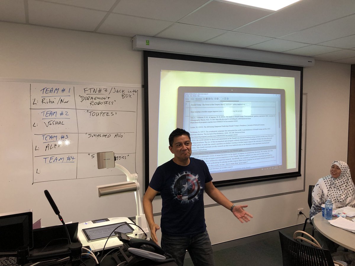FaffRobert's tweet photo. S1 2018 #rbus6914 PhD course at UQ today. #afden coursework offering. Mod#1 day 2 in full swing. #fantasypitching “Toupees” team leader Vishan pitching “Toupee Power”. Winners! https://t.co/fPUMvPEIoS