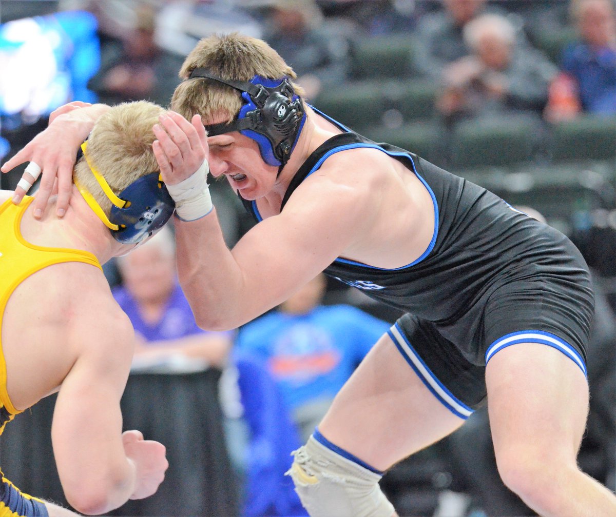 STATE CHAMP: Photos from Cade King's 6-4 victory over Calvin Sund. The junior finishes the season 44-0.