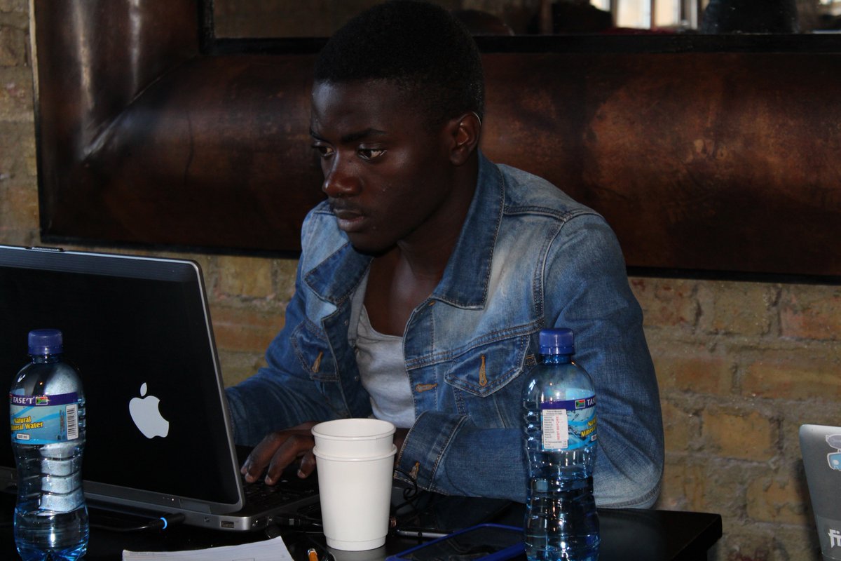 TiyaniTee's tweet photo. Members of team Hackstasm at #NTBDHack - eyes on the code. Focus is key. #BudgetData #Budget2018 https://t.co/rWiVlw68VY