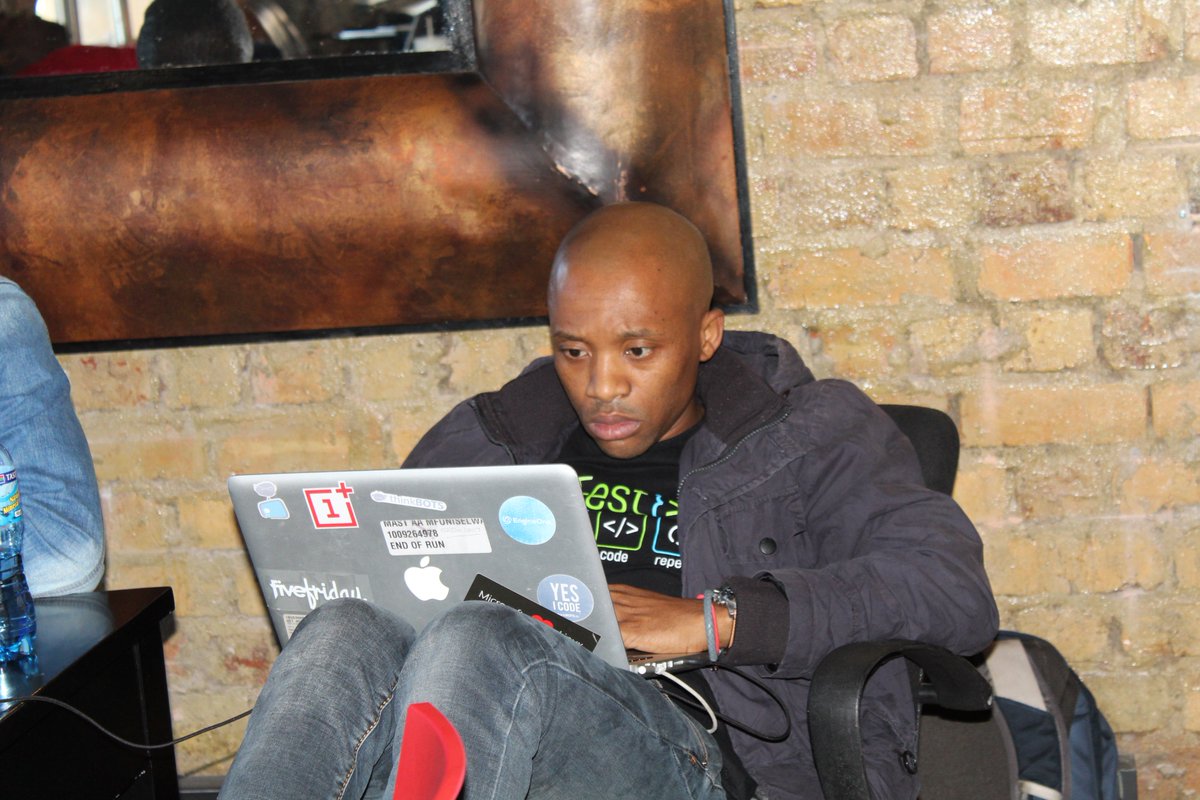 TiyaniTee's tweet photo. Members of team Hackstasm at #NTBDHack - eyes on the code. Focus is key. #BudgetData #Budget2018 https://t.co/rWiVlw68VY