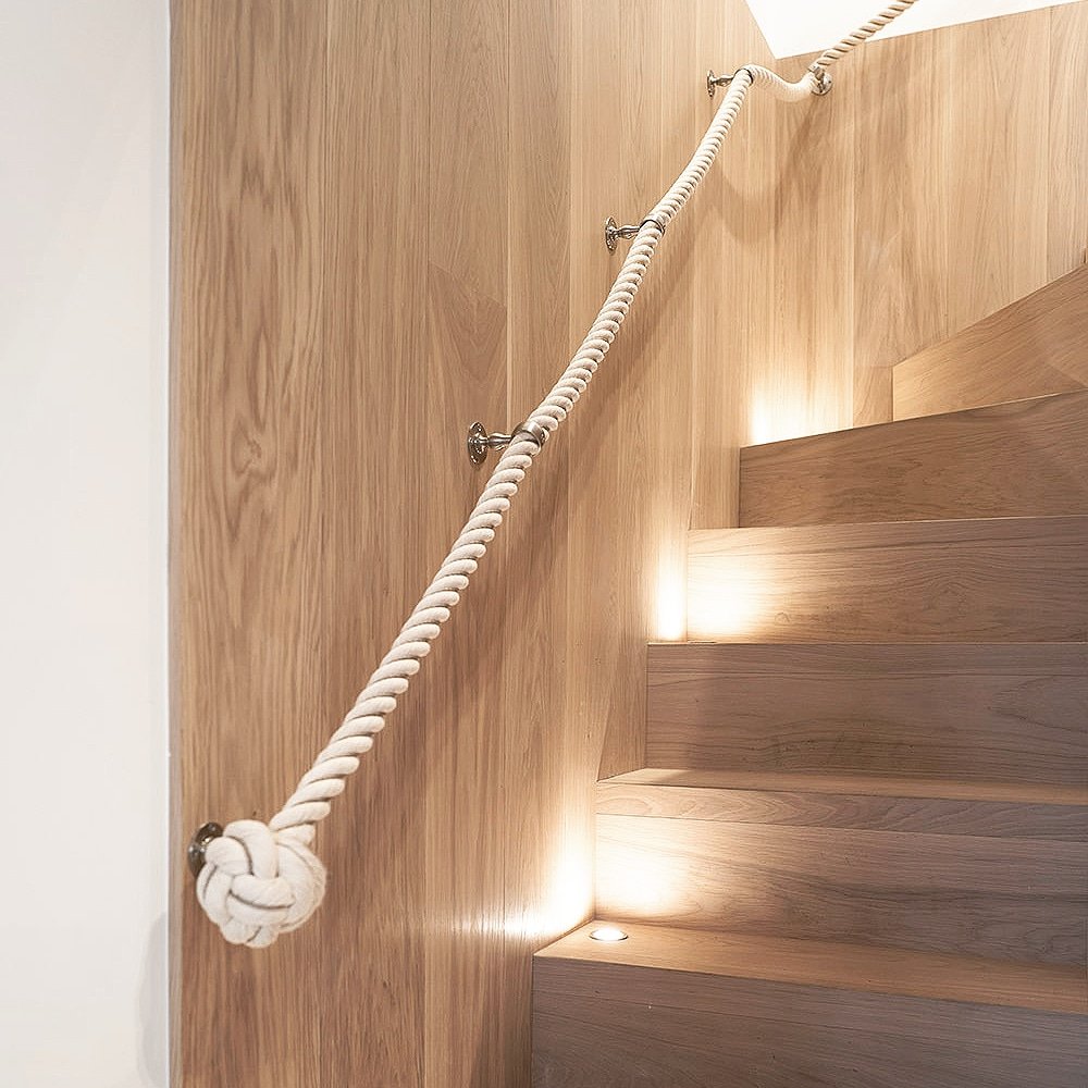 STAIR ROPE - minimal timber stair insert needed to perform so many gymnastics that only a rope would suffice (36mm natural hemp with brass blacksmith brackets + manrope knots) #Stairs #stair #stairgoals #architecture #architecturelovers #architecturedesign #interiordesign #anthro