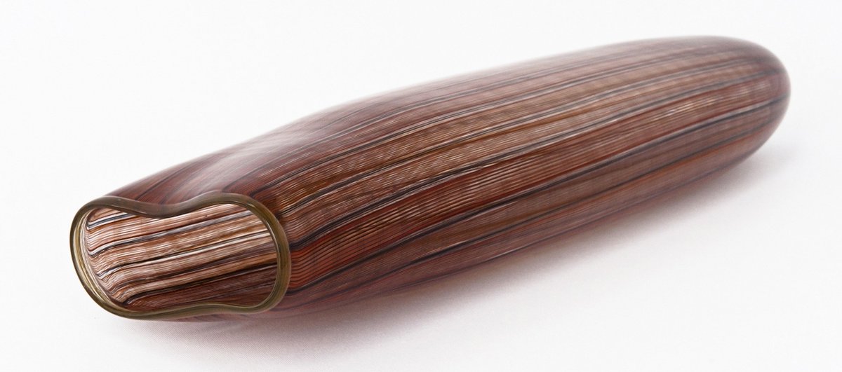 glass-blown 'dillibag' by Jenni Kemarre Martiniello on left, woven (pandanus leaf) dilly bag by Carla Matjandajpi on right