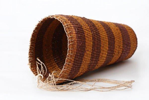 glass-blown 'dillibag' by Jenni Kemarre Martiniello on left, woven (pandanus leaf) dilly bag by Carla Matjandajpi on right