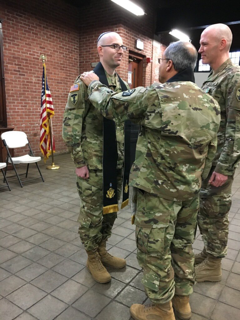 RINationalGuard's tweet photo. Passing of the stole ceremony for the 103rd FA #ArmyChaplains. Thanks and
appreciation to Cpt. John Hatfield for his dedication to #Soldiers. Welcome
incoming chaplain Cpt. Aaron Rozovski, our first #RIARNG Jewish Chaplain.
#RIsHomeTeam https://t.co/XCEG0nDTDU
