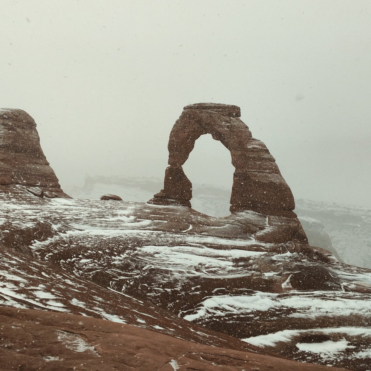 outdoortravella's tweet photo. Delicate Arch in the snow was simply incredible. #utah #utahdaily #utahexplored #utahoutdoors #outdoors #outdoorslife #getoutdoors #getoutside #optoutside #neverstopexploring #peoplewhooutdoor #peoplewhohike #arches #redrocks #nationalpark #hiking @ArchesNPS https://t.co/KNESqIocAQ