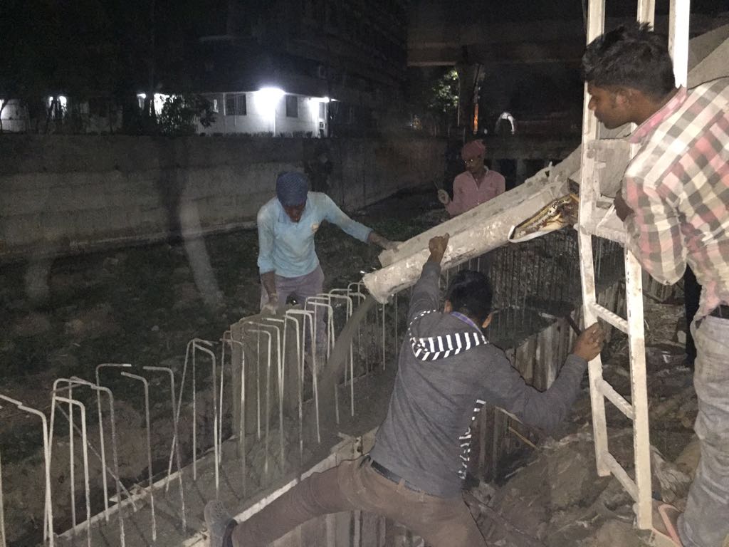Laying RMC M30 grade to retaining wall of Picket Nala , Begumpet.