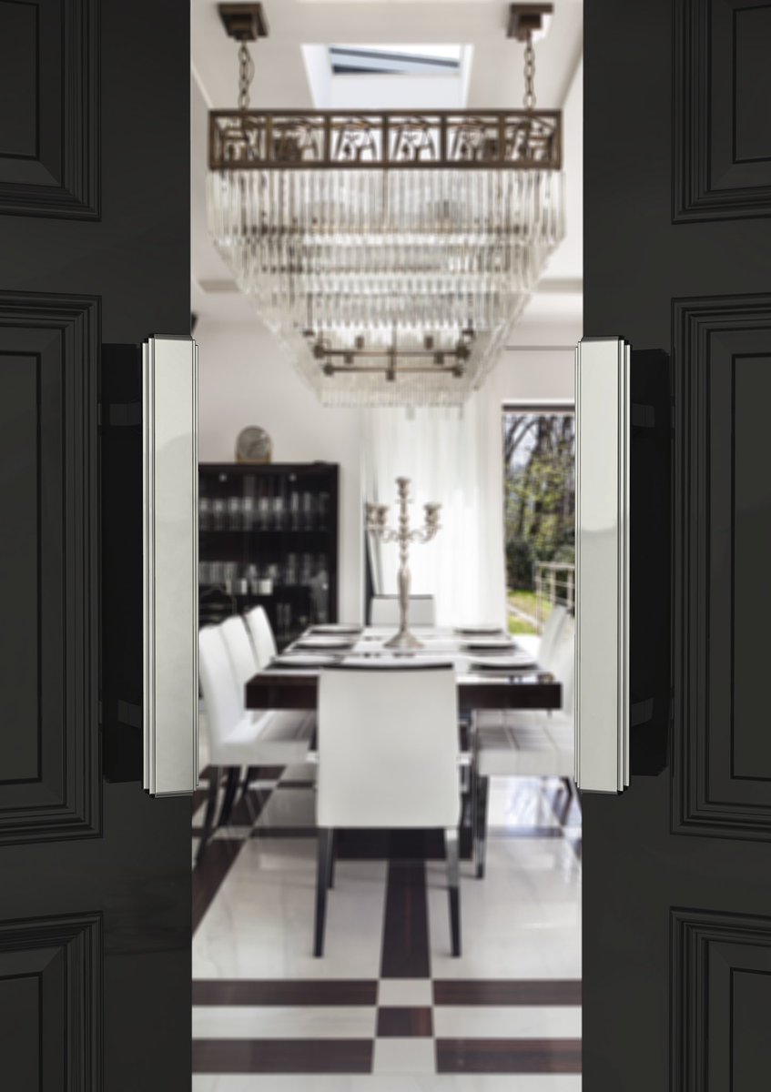 Striking! Our ‘Amr’ pull handle in polished Nickel on this stunning gloss black door! #interiordesign