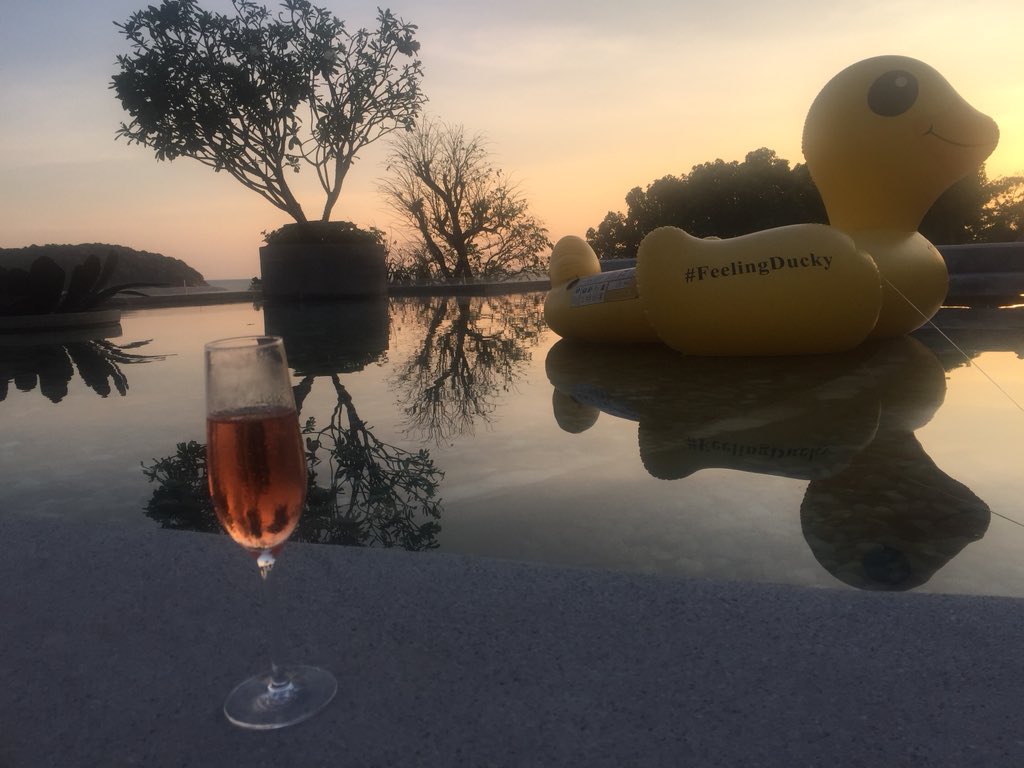 niannelynn's tweet photo. Sundowners by the pool at @TheNaiHarn #Chandon #ChandonxSeafolly #sparklingwine #ChandonRose #Phuket #Thailand @montreepr https://t.co/9a3hj9kJPB