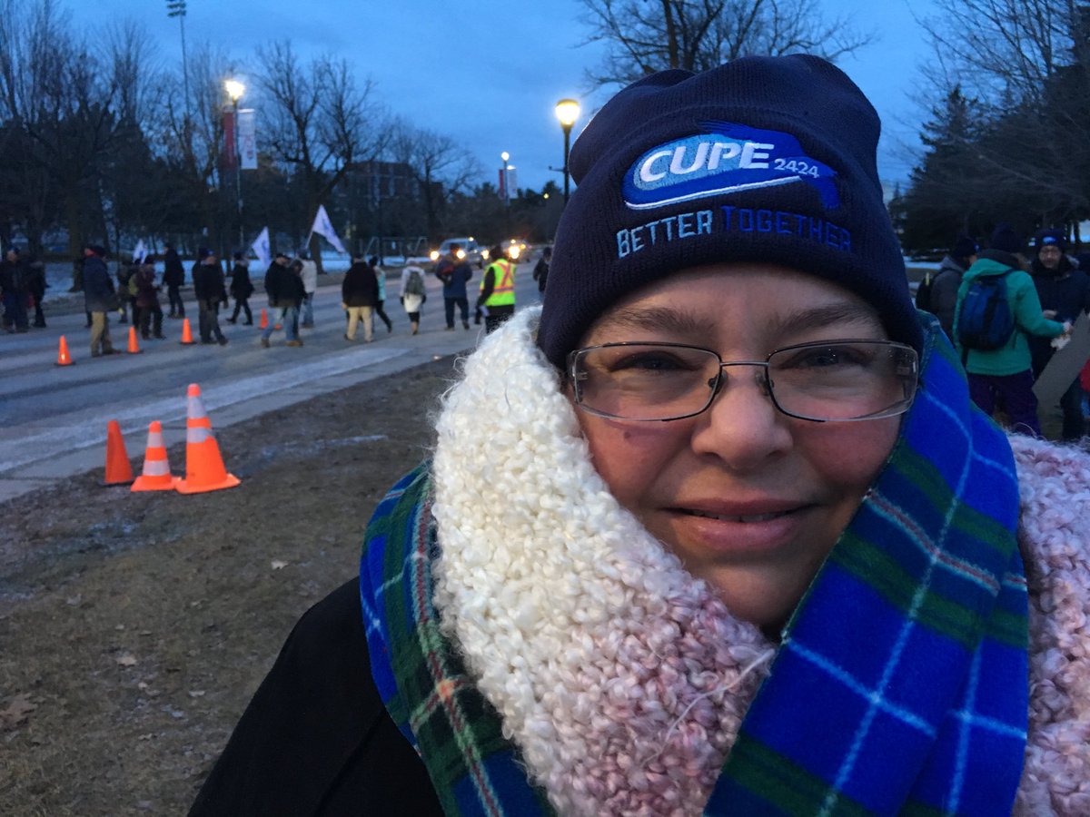 HallieCBC's tweet photo. Support staff at @ucarleton on strike. Pam Griffin-Hody is past prez CUPE 2424 & retired in Dec. She drove 15 hours from Halifax to picket with her “brothers and sisters.” https://t.co/ZKevRElBRx
